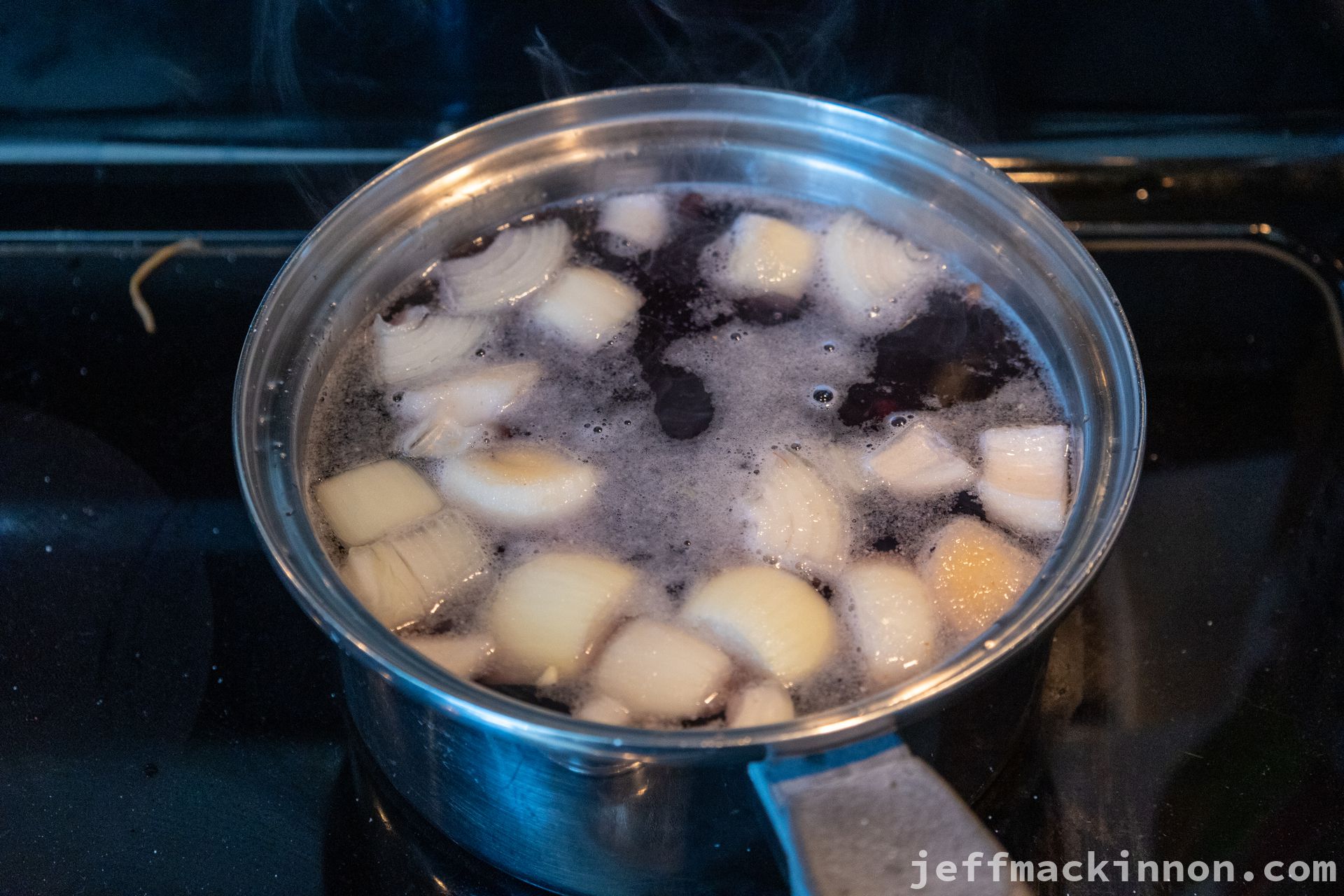 Black Beans boiling in a pot.