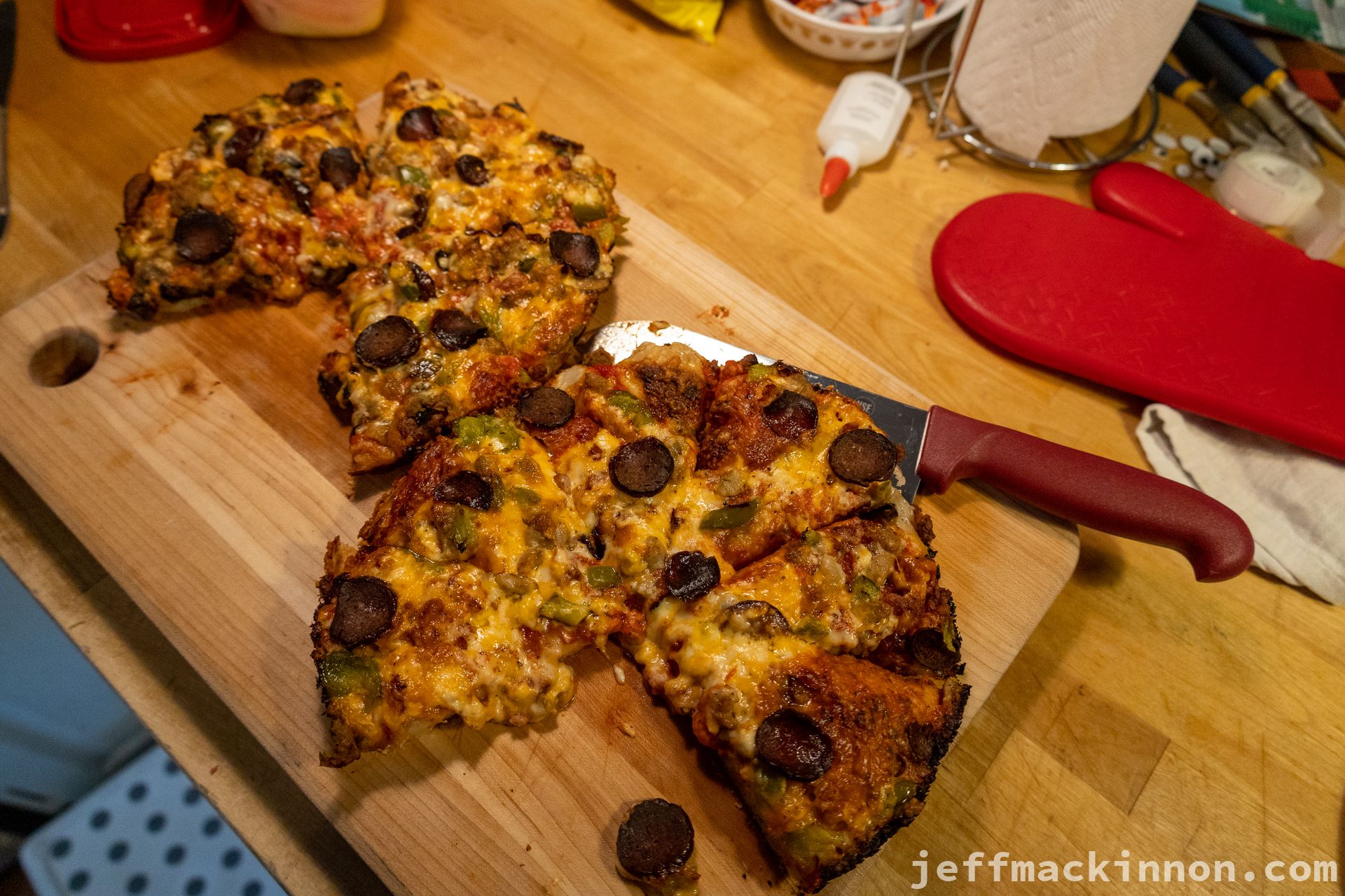 Pan pizza with a couple of slices missing