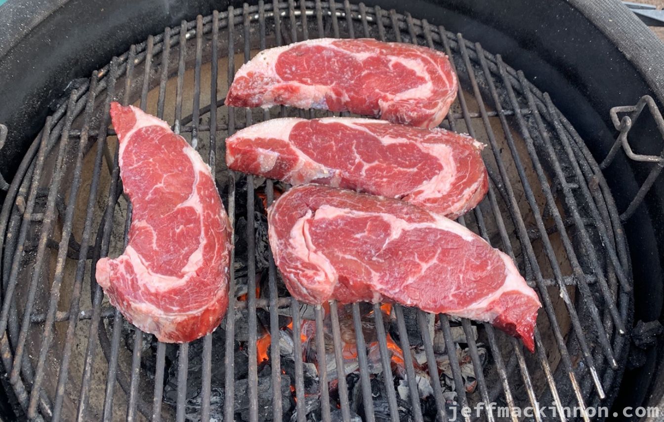 A few steak on the grill