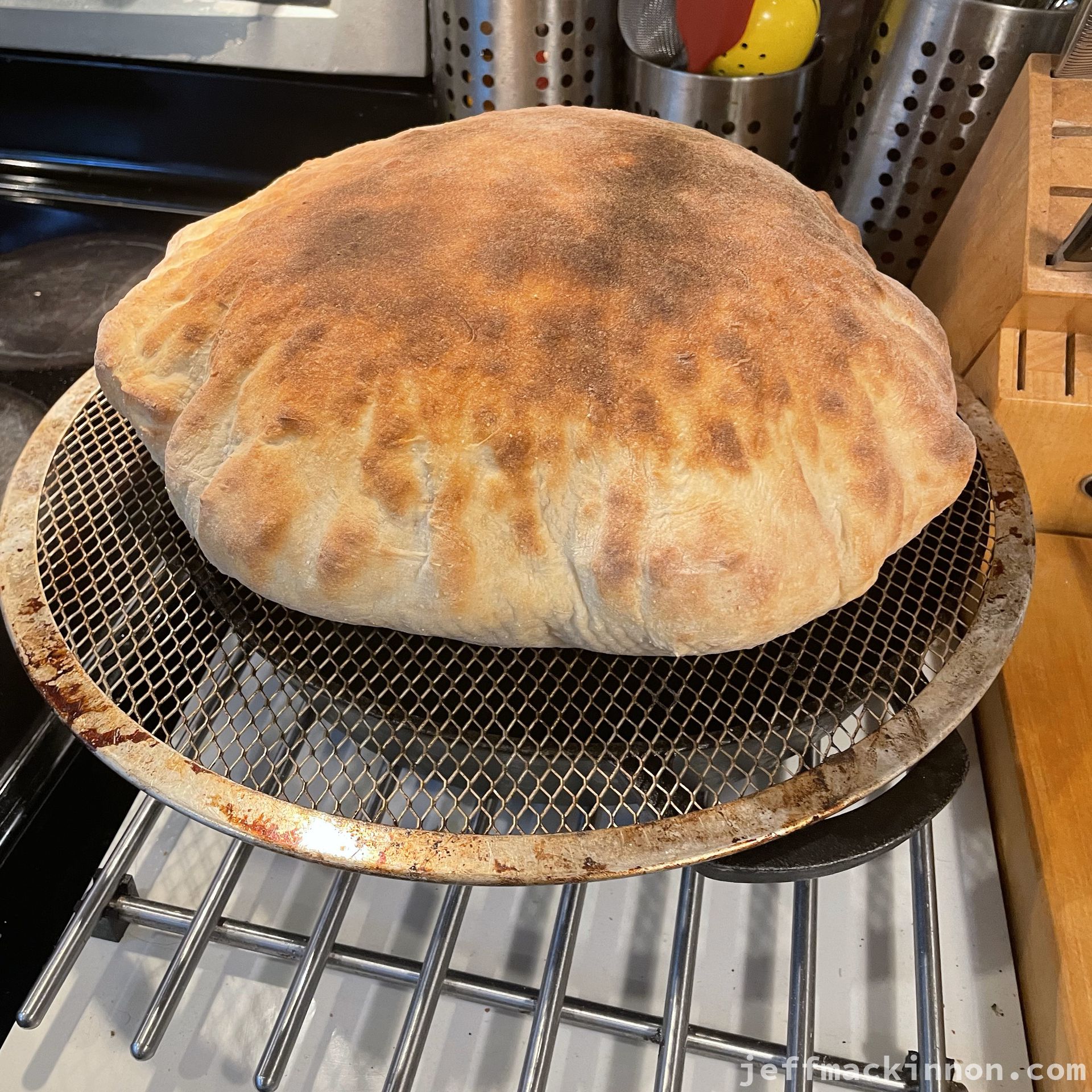 pizza dough puffed up like a pita bread